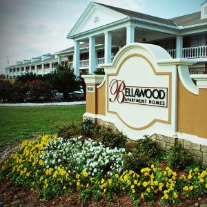 Bellawood Main Sign with flowers