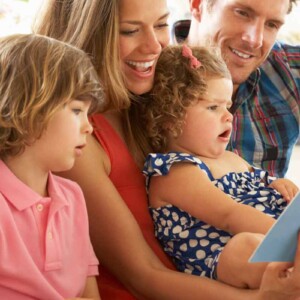 family reading a book together